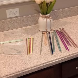 Various sizes knitting needles and crochet hooks